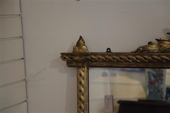 A Victorian carved and giltwood overmantel, W.4ft 4in. H.5ft 1in.